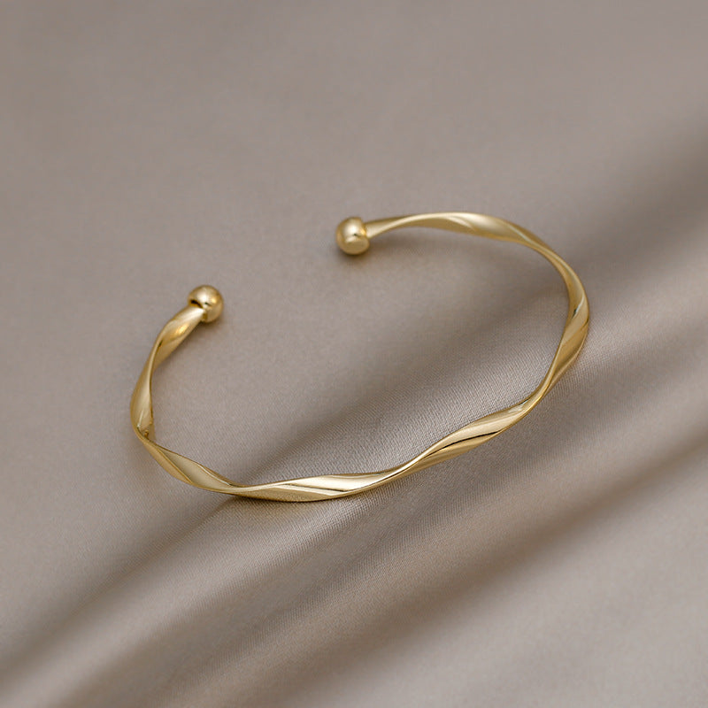 Simple Twist Gold Bracelet