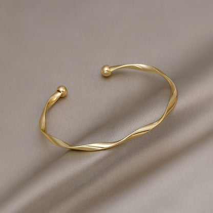 Simple Twist Gold Bracelet