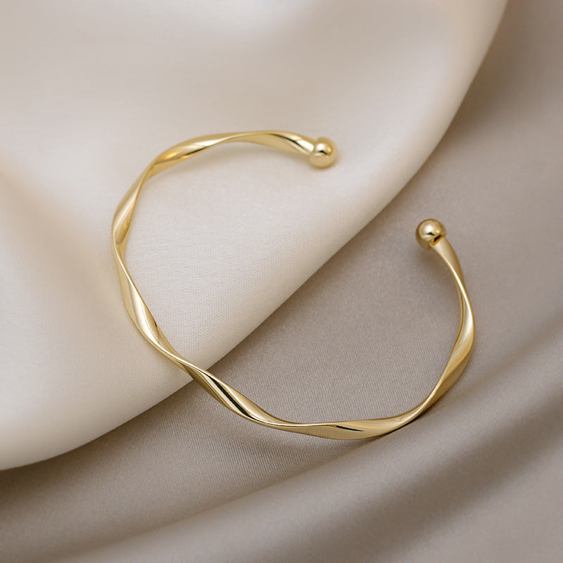 Simple Twist Gold Bracelet