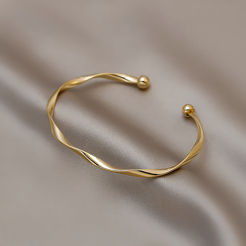 Simple Twist Gold Bracelet