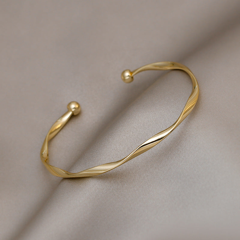 Simple Twist Gold Bracelet